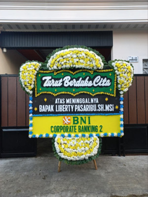 Papan Bunga Duka di Teluk Mengkudu