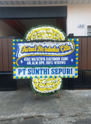 Papan Bunga Duka di Teluk Mengkudu