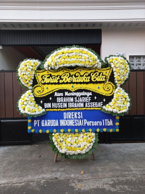 Papan Bunga Duka di Teluk Mengkudu