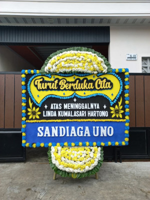 Papan Bunga Duka di Teluk Mengkudu